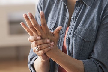 Older-Black-woman-rubbing-her-hands--Arthritis_360x240